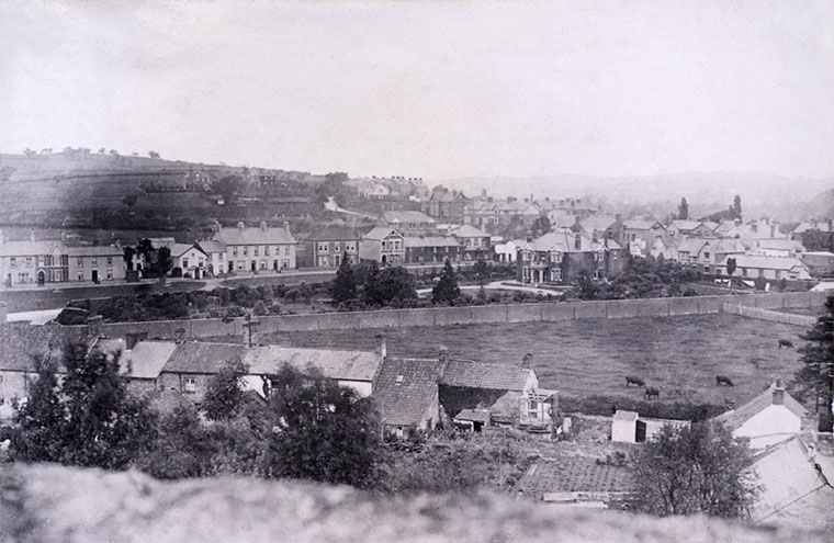 View from St. Cadoc's Church Tower, Caerleon,  looking over Church Street, the Croft and Goldcroft Common towards Lodge Hill. Photo by William Henry Thomas, around 1910.