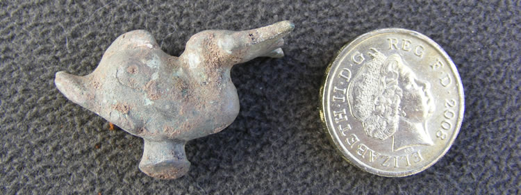 Small bronze dolphin found during the 2010 Caerleon Excavations.