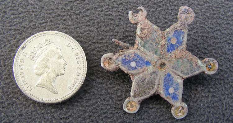 Enamelled badge found during the 2010 Caerleon Excavations.